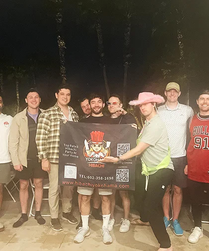 guests enjoying hibachi catering service at backyard party in Las Vegas